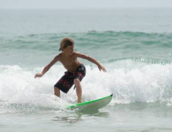Young Boy Surfing